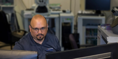 TSS team member working intently